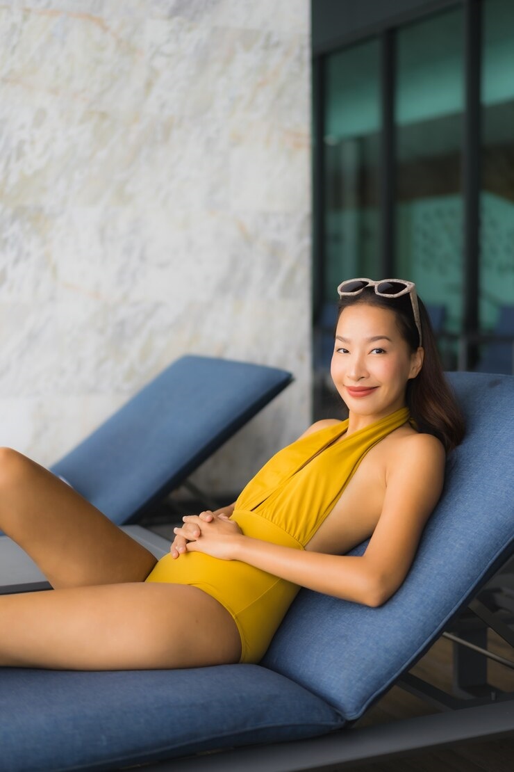 20250129194932-e586f2ca1855-portrait-asian-beautiful-young-woman-happy-smile-relax-around-outdoor-swimming-pool-holiday-vacation_74190-9159.jpg